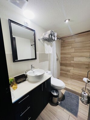 Hair dryer, towels, soap, shampoo