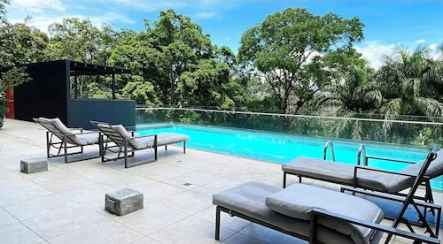 Cozy Apartment 10 min to Airport Be Cariari Condo new