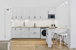 Fridge, microwave, stovetop, coffee/tea maker