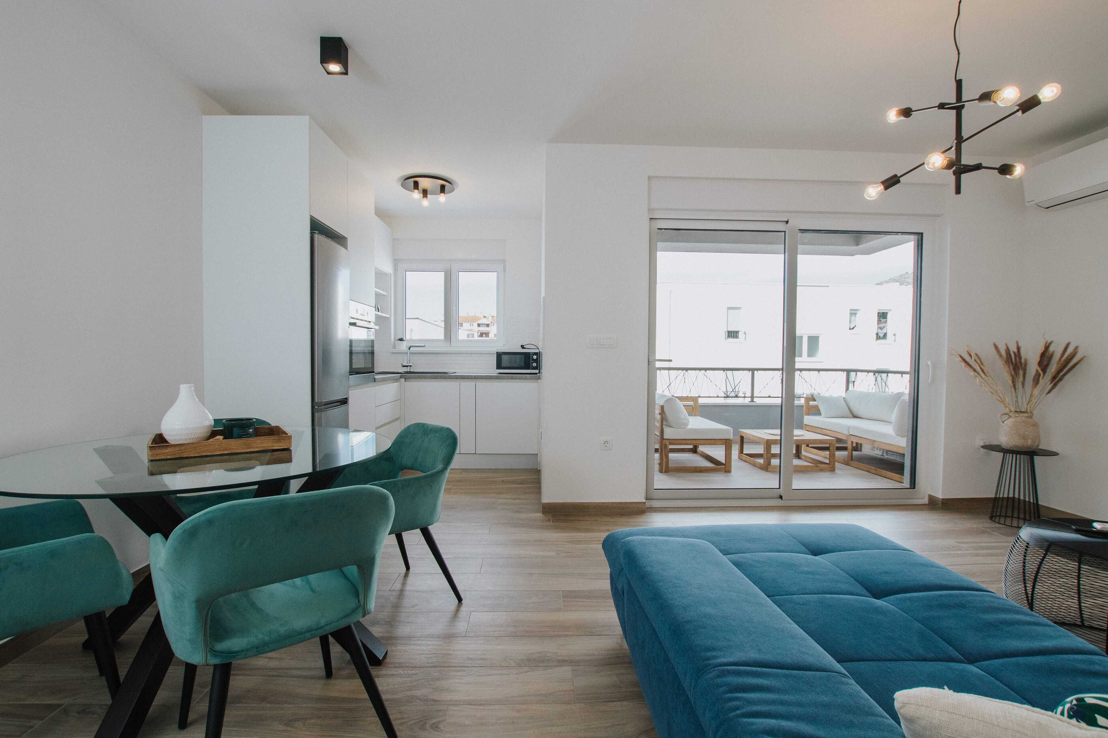 Apartment (Standard Two Bedroom Apartment (Nora)) | Living room | 32-inch flat-screen TV with cable channels