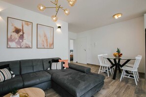 Apartment (Classic Two Bedroom Apartment (Coral)) | Living room | 32-inch flat-screen TV with cable channels - Spacious Luxury Trogir Apartments (Trogir)