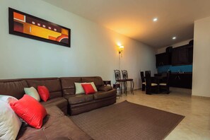 Deluxe Townhome, Patio, Garden View | Living area | TV - Spacious Villa with Pool, Soccer and Cricket Field (Zapopan)