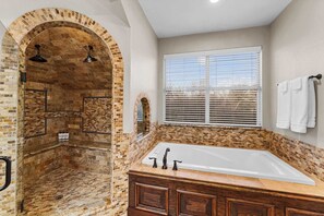Shower, hair dryer, towels, shampoo