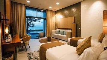 Double or Twin Room, Beach View | Individually decorated, individually furnished, desk, laptop workspace