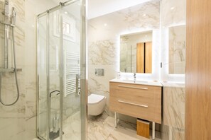 Shower, free toiletries, hair dryer, towels