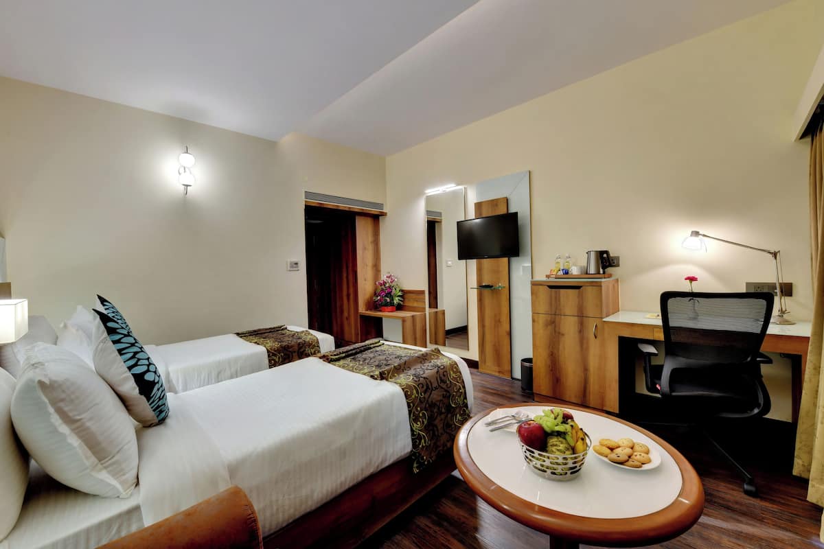 Premium Room | 1 bedroom, minibar, in-room safe, laptop workspace
