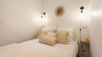 1 bedroom, desk, iron/ironing board, travel crib