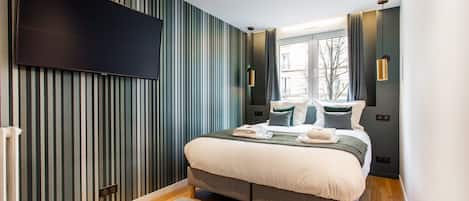 2 chambres, fer et planche à repasser, Wi-Fi, draps fournis