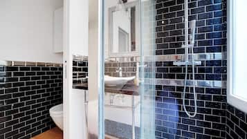 Shower, hair dryer, towels, shampoo