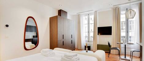 1 bedroom, desk, iron/ironing board, travel crib