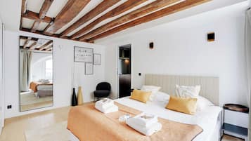 1 bedroom, desk, iron/ironing board, travel crib