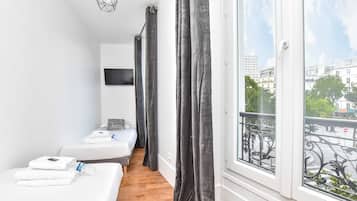 2 habitaciones, tabla de planchar con plancha, wifi y ropa de cama