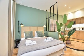 1 bedroom, desk, iron/ironing board, travel crib