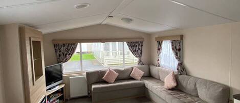 Cabin | Living area | TV, fireplace