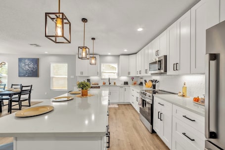 House (4 Bedrooms) | Private kitchen | Microwave, oven, stovetop, dishwasher