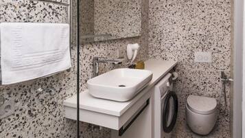 Premium Apartment, 2 Bedrooms | Bathroom | Shower, slippers, towels, soap