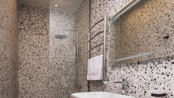Shower, slippers, towels, soap