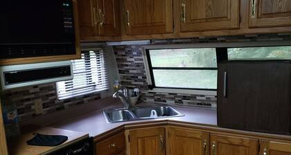 Cozy primitive Rambler RV in Westport Renovo Pa river access
