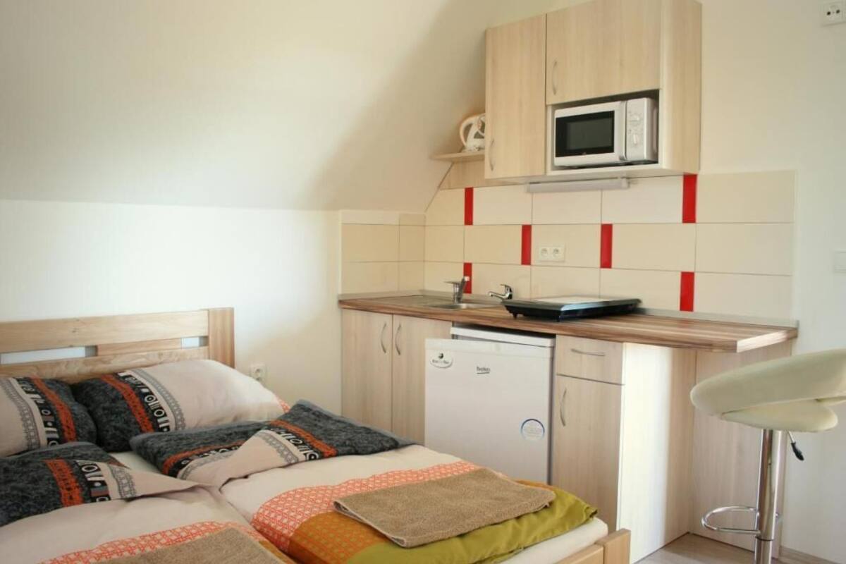 Apartment, 1 Bedroom, Kitchenette, Garden View | Private kitchen | Full-size fridge, microwave, stovetop, cookware/dishes/utensils