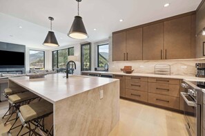 Fridge, microwave, oven, stovetop - One Riverfront Condo 400 (Avon)