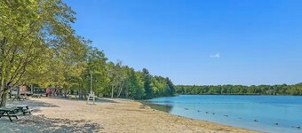 Cozy lake house, great location! Hot tub, fire pit, game room! Dog friendly!