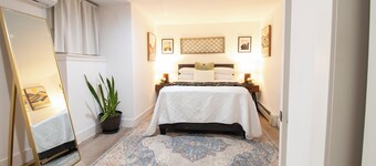 Central 2BR, Garden Suite, Top Amenities & Care!