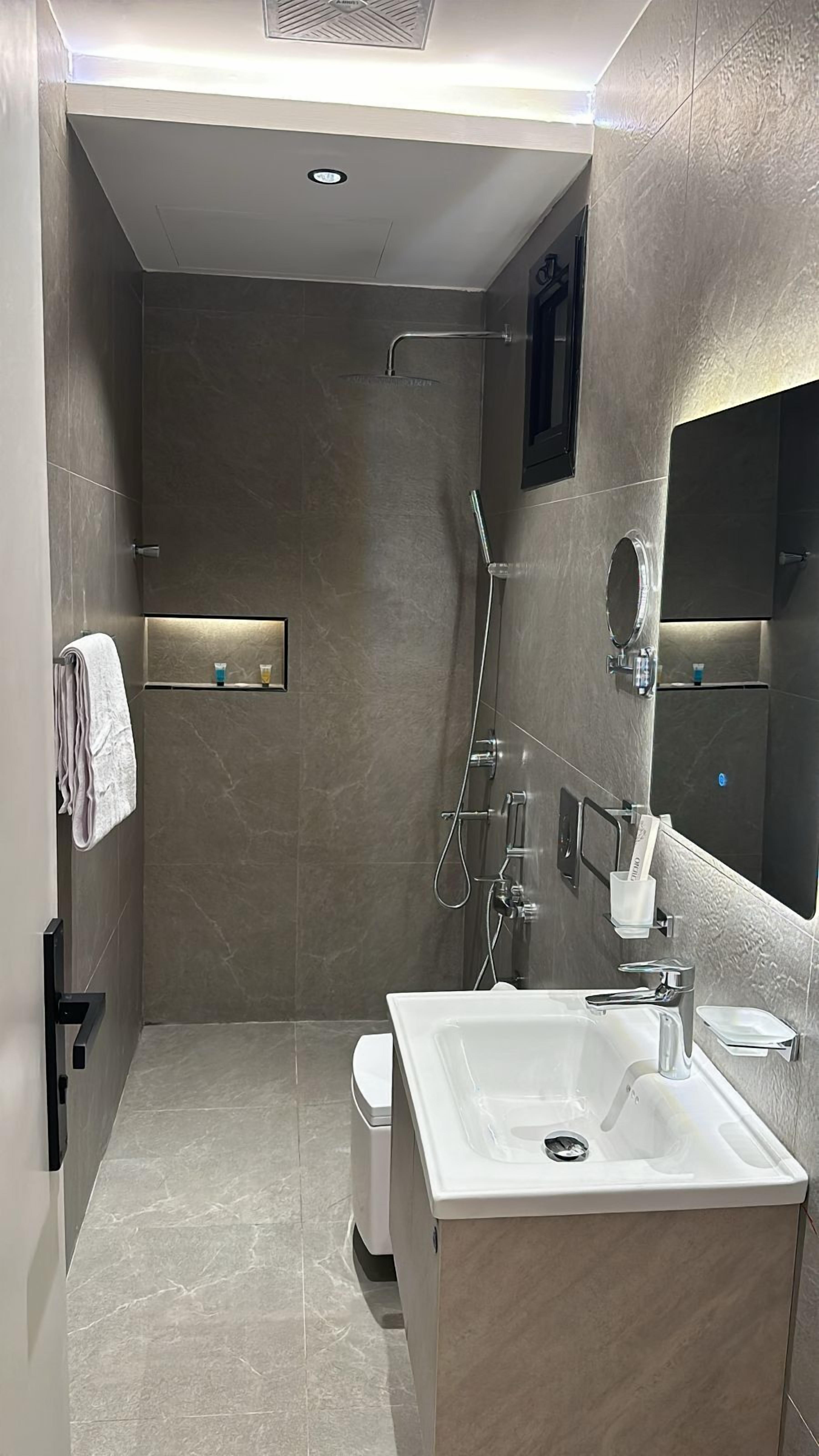 Basic Double Room | Bathroom | Free toiletries, slippers, towels, soap