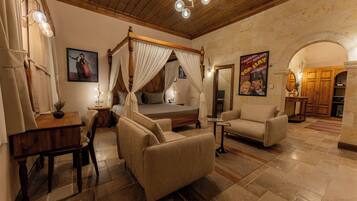 Stone Mansion Suite | Minibar, in-room safe, individually decorated, individually furnished
