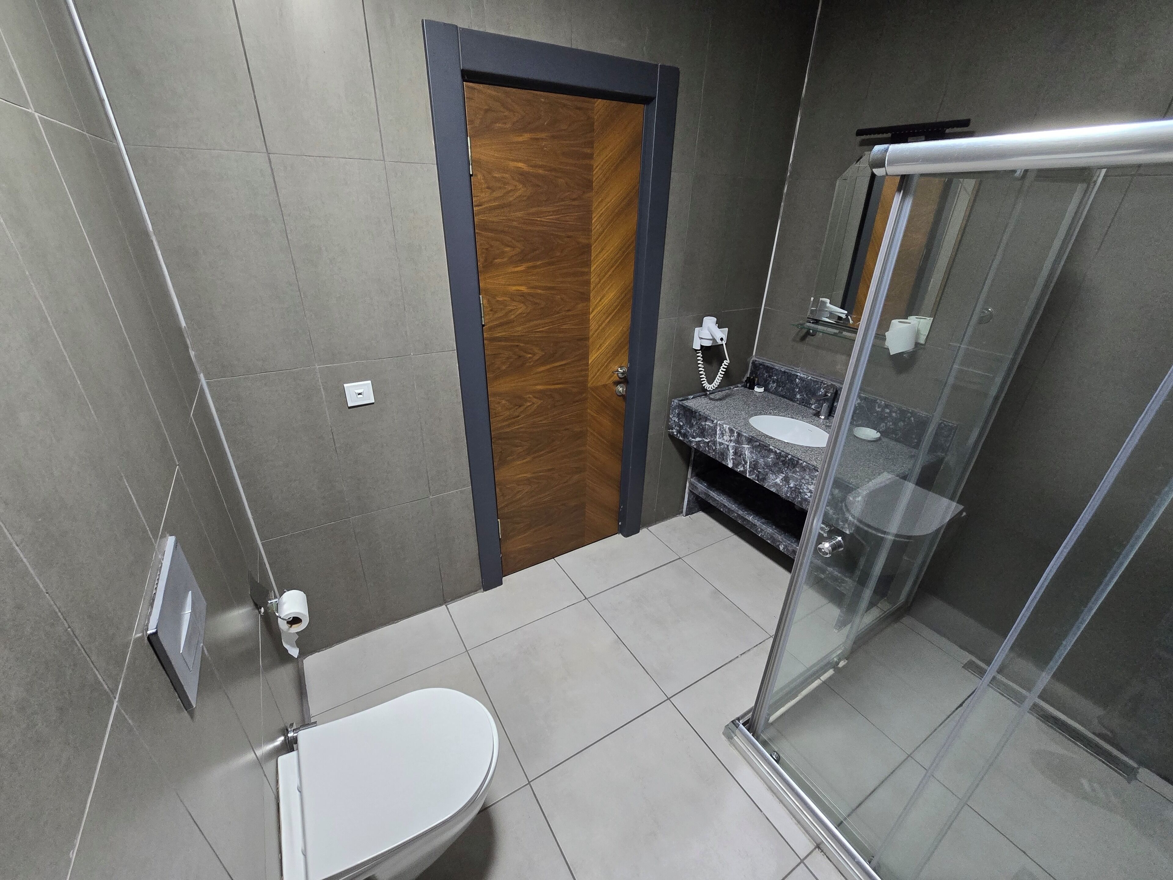 Twin Room, River View | Bathroom | Shower, hair dryer, slippers, towels