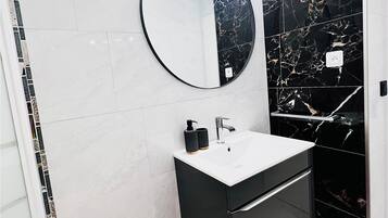 Hair dryer, towels, soap, shampoo