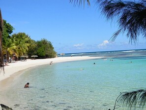 On the beach, white sand
