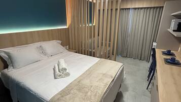 1 bedroom, laptop workspace, blackout curtains, iron/ironing board