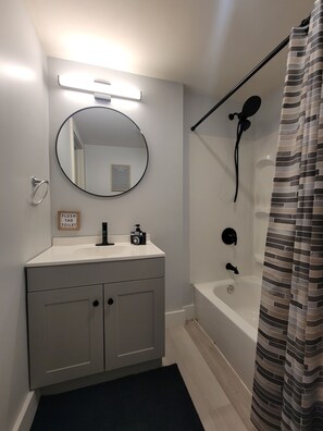 Hair dryer, towels, soap, shampoo