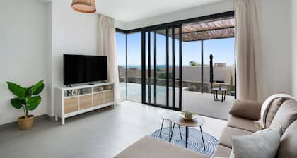 Villa de vacances 'Yucas 13' avec vue sur la mer, Wi-Fi et climatisation