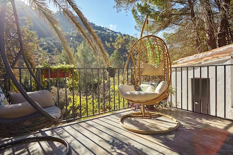 Terrace/patio. Country House 'Casa Arroyo Colmenar' with Mountain View, Pool and Air Conditioning