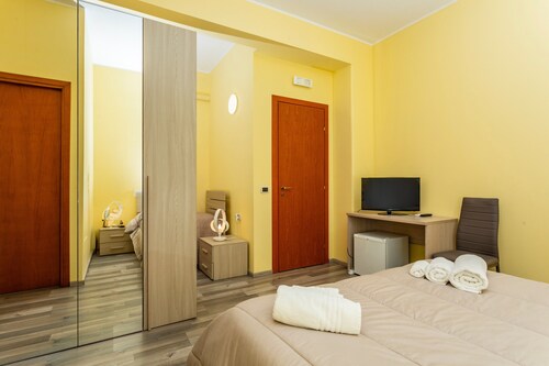 Room 'Seaside and City - Quadrupla' with Shared Terrace, Wi-Fi and Air Conditioning