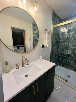 Shower, towels, soap, shampoo