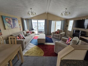 Cabin | Living area | TV, fireplace