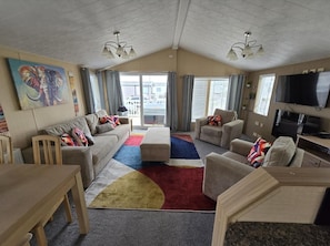 Cabin | Living area | TV, fireplace