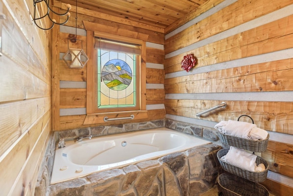 Shower, jetted tub, hair dryer, towels