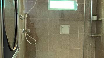 Shower, towels, soap, toilet paper