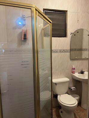 Shower, towels, soap, shampoo