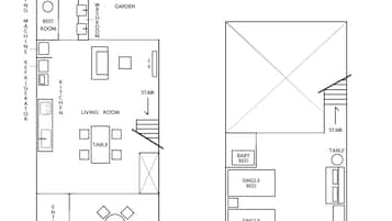 A floor plan of a hotel with a living room, kitchen, and separate bedrooms.