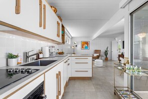 Fridge, coffee/tea maker, cookware/dishes/utensils