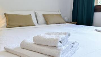 Fer et planche Ă repasser, draps fournis