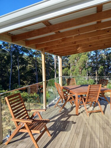 cosy cottage with wood heater, surrounded by bushland