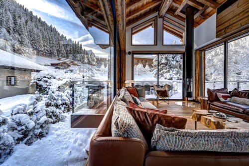 Chalet de luxe avec conciergerie et piscine de 10m
