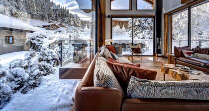 Chalet de luxe avec conciergerie et piscine de 10m