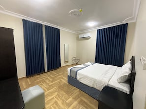 Apartamento família, 2 quartos | 2 quartos, cofres nos quartos, quartos à prova de som, Wi-Fi de cortesia