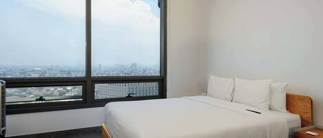 1 habitación, tabla de planchar con plancha, cuna de viaje y wifi